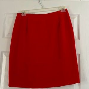 Red pencil skirt.